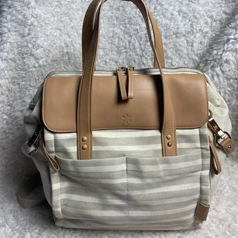 Skip Hop High line convertible Diaper Bag Beige & gray canvas tan leather straps